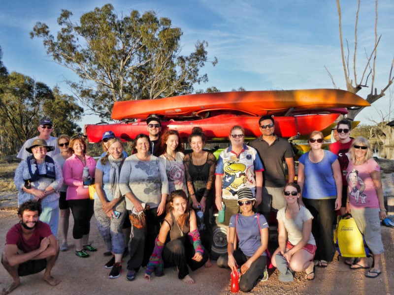 Berri Kayaking Group paddlers pose in front of a trailer load of kayaks