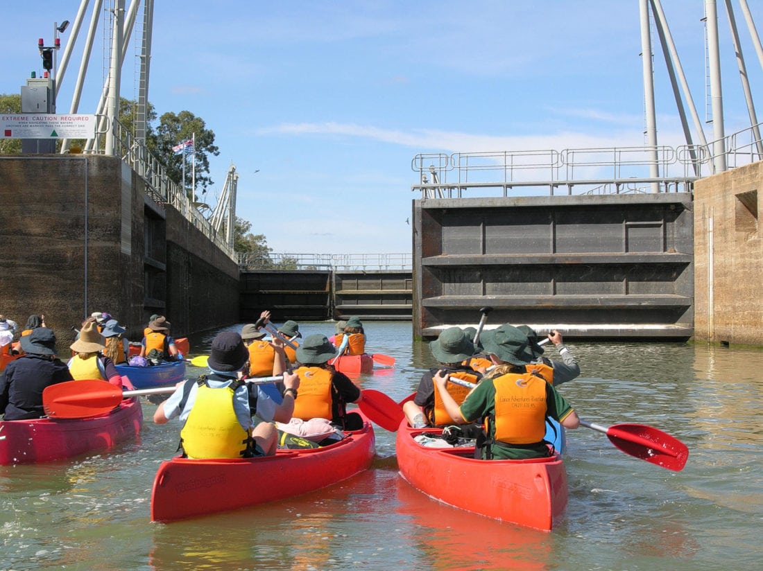Canoe Camping group entering a Lock