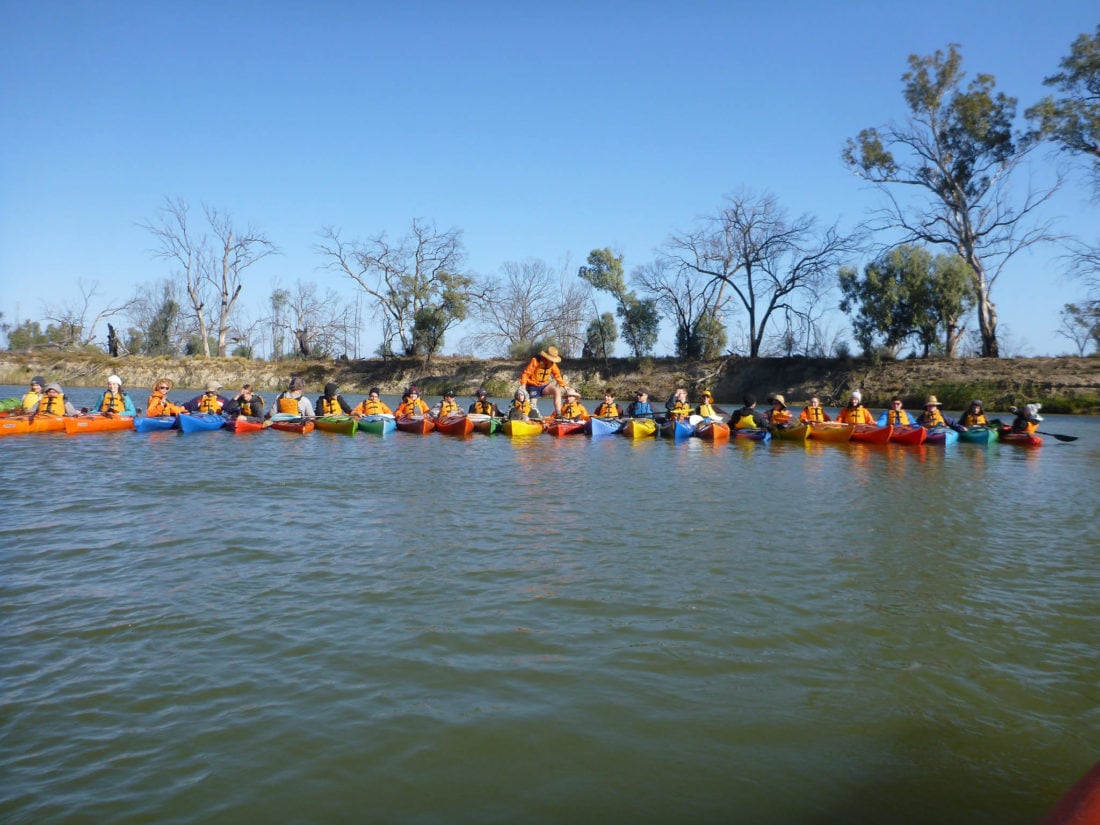 school group kayak instruction practicing rafting up