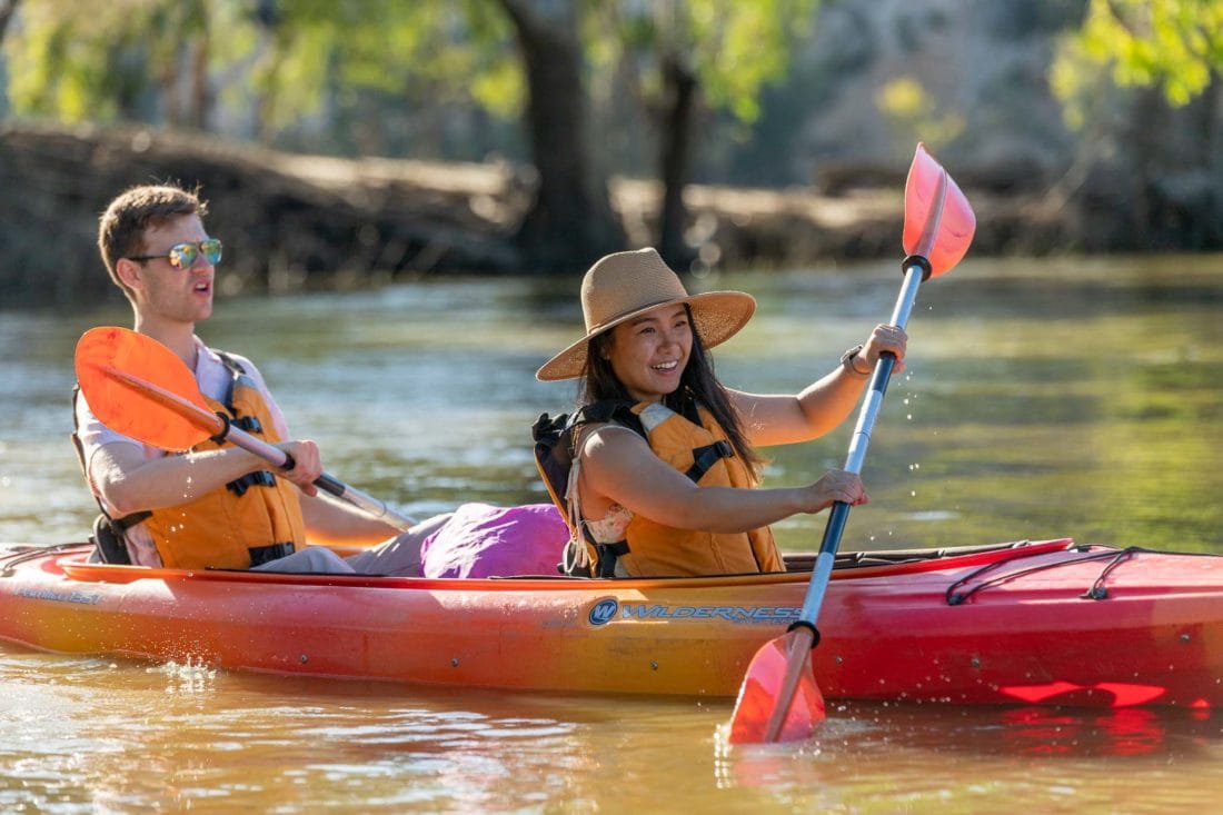 Young couple in kayak, on the Murray River.
